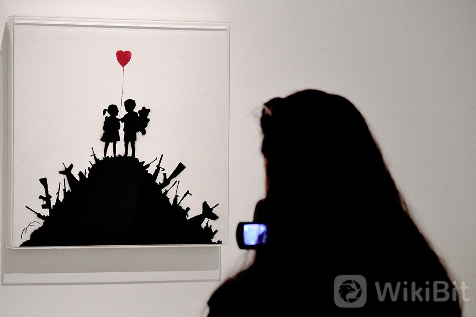 kaws-banksy-auction-phillips-01.jpg